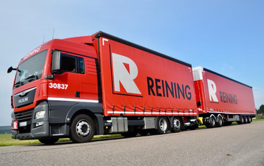 Reining Transport B.V. MAN 24.430 Low met gestuurde naloopas LZV uitvoering